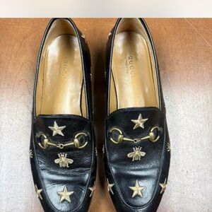 Gucci Black Leather Loafers with Gold Star and Bee Embellishments